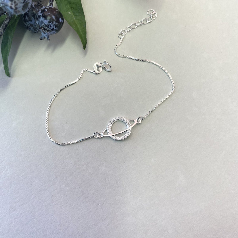 Pulseira Planeta Cravejado – O Brilho do Universo em Suas Mãos